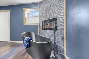 Soaker tub and fireplace