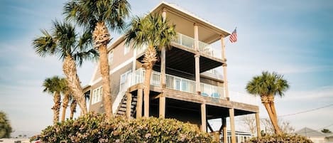 Crane Cottage is beach luxury just steps from the white sand of the gulf!