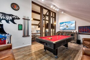 Game Room : Pool Table, Arcade Game, 90" SMART TV, Surround System, Connect 4 on wall, and board games. 