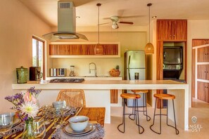 A fully-equipped kitchen with new appliances for healthy meals prepared at home