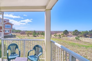 Boardwalk Breeze - The private balcony is perfect for watching the vibrant multi-colored sunsets!