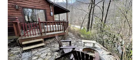 Private fire pit with seasonal views and year round sounds of the creek