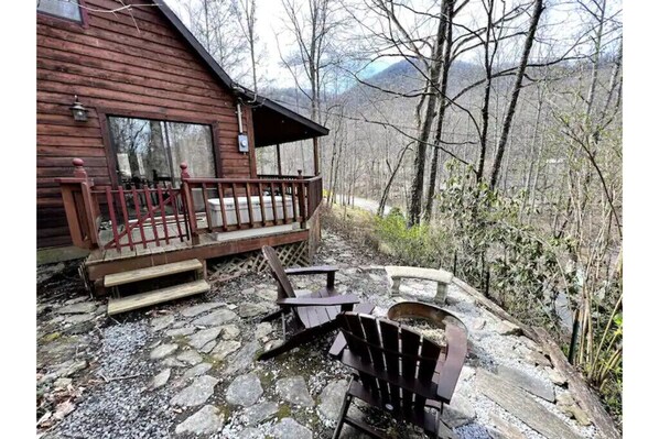 Private fire pit with seasonal views and year round sounds of the creek