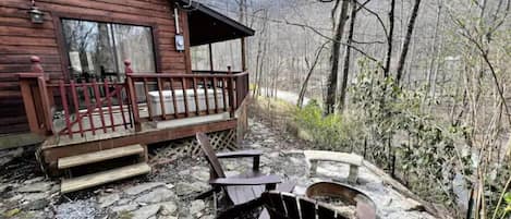 Private fire pit with seasonal views and year round sounds of the creek