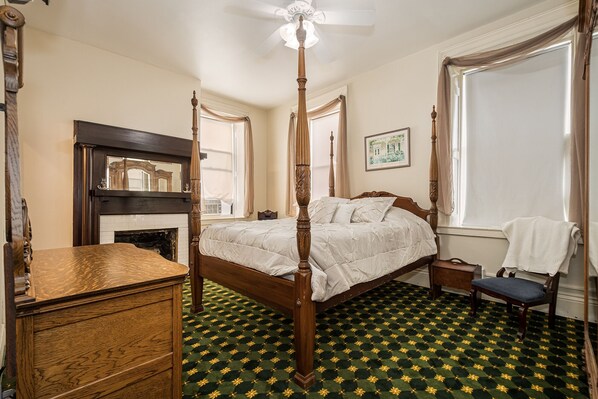 Our Braddock Room features a high Victorian bed. Location 2nd floor, front