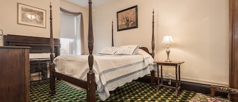 Our Monroe Room features a high Victorian bed. Location 2nd floor, back