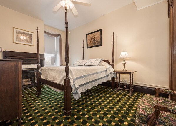 Our Monroe Room features a high Victorian bed. Location 2nd floor, back