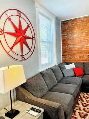 Sink into the oversized sofa and find your favorite spot. Big enough for the whole crew.