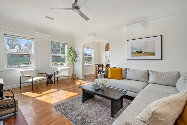 Sit back and relax! Living room featuring ample seating space and a ROKU Smart TV 