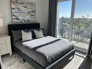 Queen bed with blackout curtains to sleep in and lots of storage