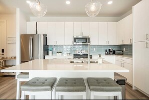 Kitchen with lots of room seating to enjoy snacks and drinks