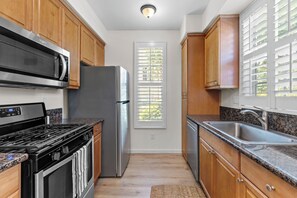Kitchen has basic cookware for a simple stay.