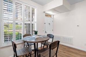 Dining table area, very bright.