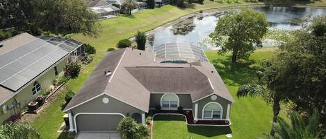 Aerial view home retention pond background