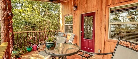 Large Covered Porch with Rope Lighting