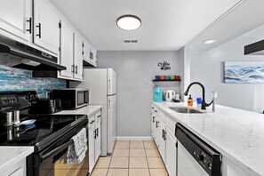New kitchen counters flow into the dining room
