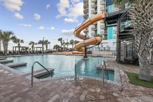 🌊 Ready to trade the beach for the pool? Enjoy exciting water fun at The Caribbean — zip down the Pirate’s Plunge, explore the Silly Submarine, or float along a lazy river. 🏴‍☠️🚀