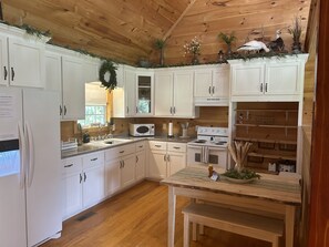 Kitchen with hand crafted Amish Dinning table 