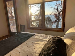 Lake view from the king bed, custom built bed with premium bedding and luxury mattress for a great nights sleep!