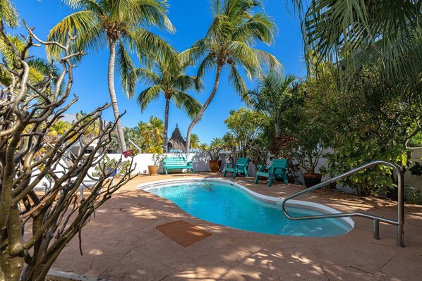Cooling off in the pool is a refreshing oasis, where the crystal-clear waters envelop you in blissful relaxation, washing away the heat of the day.