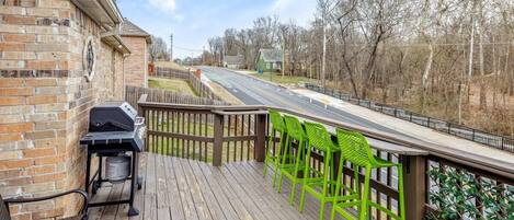 Enjoy the view of bike lanes leading to Coler Mountain biking preserve while grilling up your favorite meal or sipping a refreshing drink at the barstools.