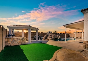 Turf and waterfall feature in our pool