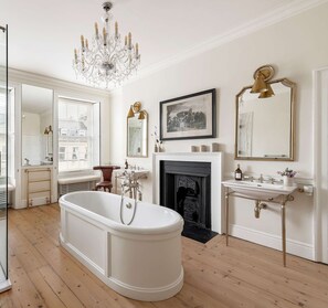 Pitt House spacious interior bathroom with a view of the outside
