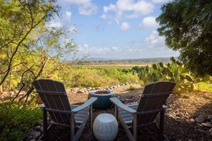 Spectacular views await early morning coffee by the fire pit.