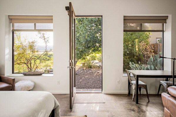 Back door opens to your personal landscaped courtyard.