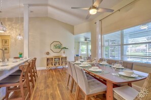 Modern dining table set against a backdrop of tasteful decor