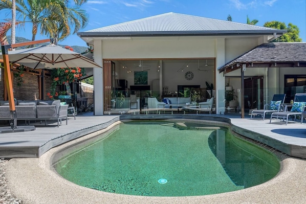 Wake up feeling refreshed after a dip in the private pool and sun bathing on the loungers.