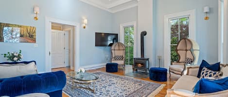 The living room is a pre-Civil-War addition and features a wood burning stove