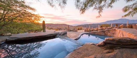 Stargaze the Milky Way while soaking in our custom rock split-level pool.