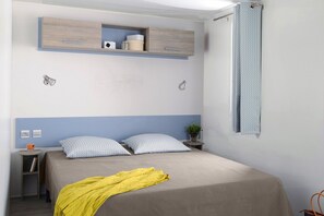 A snug area with cheerful bedding.