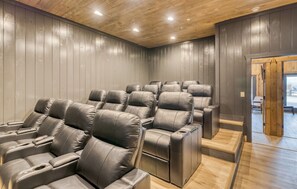 Theater room with four rows of seats