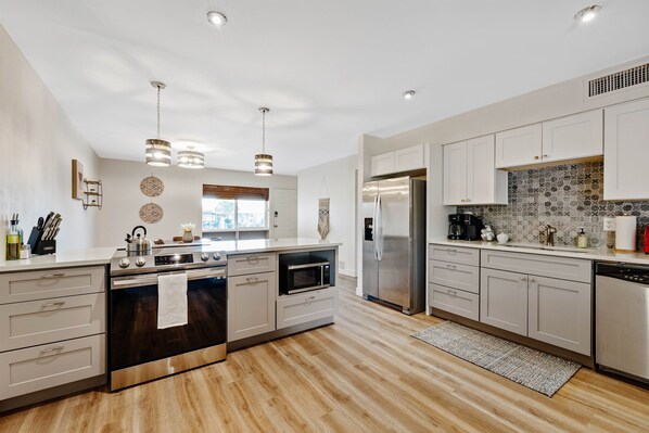 Save money cooking in with our completely remodeled and upgraded kitchen.  All new appliances, cabinets, counters and finish work completed in October 2022.