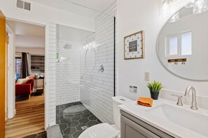 Enjoy this fully remodeled Owner's bathroom with a remodeled walk-in shower.  This bathroom is accessible from the owner's bedroom and from the living room.