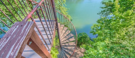 Spiral staircase leading down to the Guadalupe River