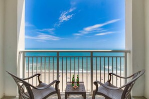 Unwind on your private balcony with uninterrupted ocean views! Enjoy your morning coffee or evening drinks while soaking in the serene beach vibes and the sound of crashing waves. Your perfect seaside retreat awaits!