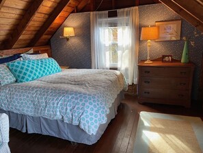 Primary bedroom with water views