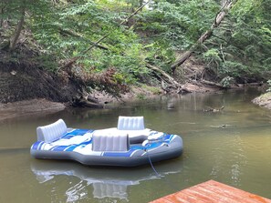 Black River, dock, and 5 person inflatable island. 