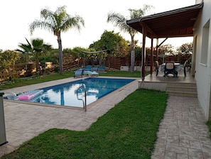 Patio, yard and swimming pool