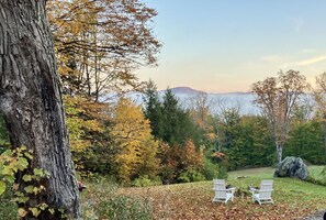 Adirondack chairs around the fire pit