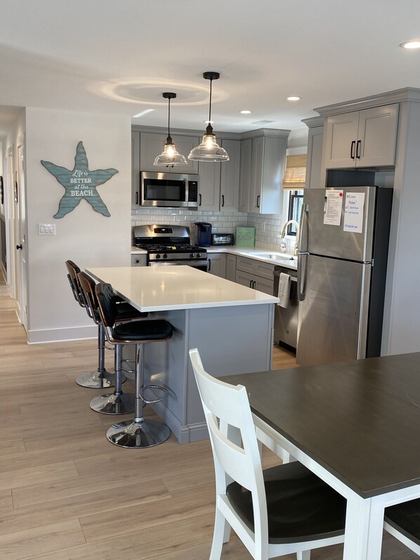 Kitchen with Island seating for 3