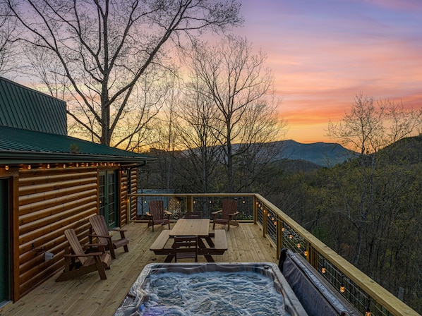 Relax and unwind in the hot tub after a long day in town and soak in the view