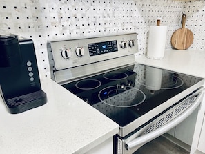 Full Kitchen: coffee maker, stove, fridge, dishwasher etc.