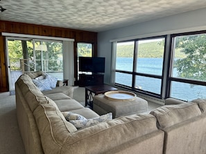 Main living area with large picture windows and amazing views of the lake!