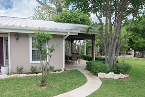 Front of Property and Covered Sitting Area