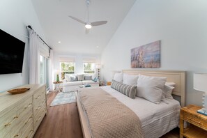 The primary bedroom has a king bed and en-suite bath