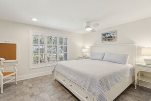 2nd Bedroom with a Flat Screen Smart TV, Desk Area, and Attached Full Bath (King Bed)